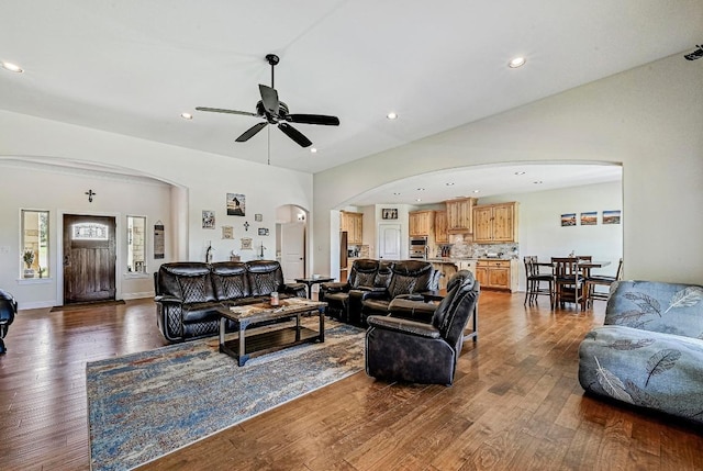 312 First Down Dash, Bertram, TX 78611 - living area featuring arched walkways, dark wood-style flooring, ceiling fan, and recessed lighting