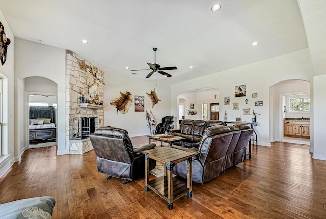 312 First Down Dash, Bertram, TX 78611 - living area featuring a ceiling fan, hardwood / wood-style flooring, arched walkways, and recessed lighting