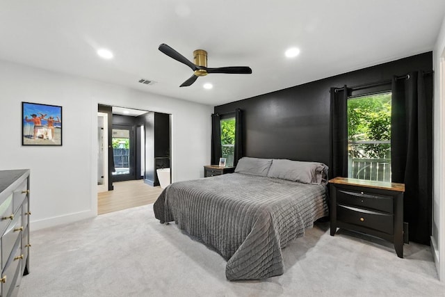 12501 Mixson Dr, Austin, TX 78732 - bedroom with light colored carpet, multiple windows, recessed lighting, and a ceiling fan