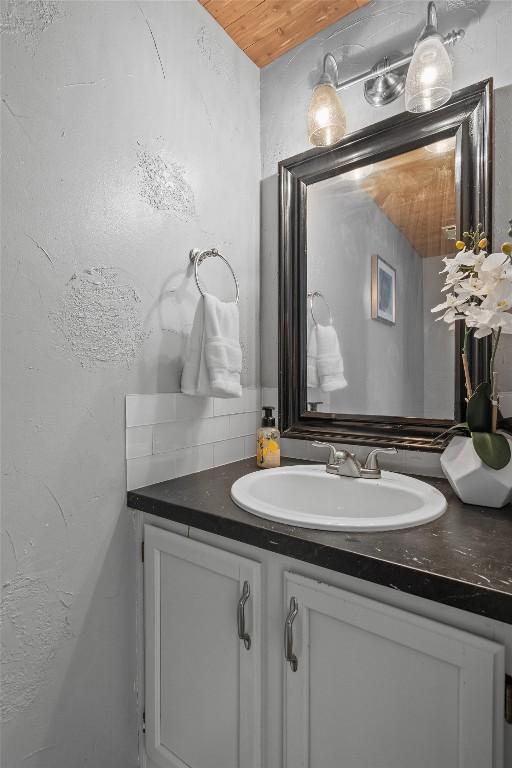 501 Battlecreek Ln, Leander, TX 78641 - bathroom featuring vanity and wooden ceiling
