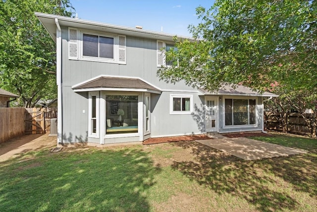 501 Battlecreek Ln, Leander, TX 78641 - rear view of property featuring a fenced backyard, a patio, and a gate