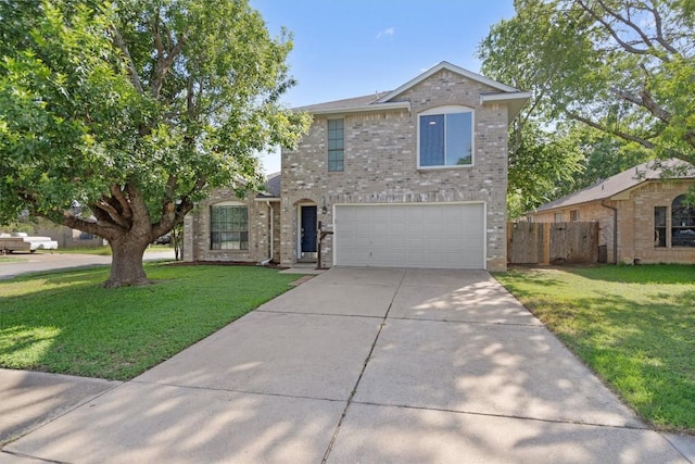 501 Battlecreek Ln, Leander, TX 78641 - traditional-style house featuring driveway, a garage, and brick siding