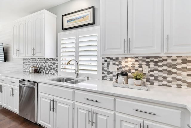 10601 Showboat Cv, Austin, TX 78730 - kitchen with dishwasher, light countertops, white cabinets, decorative backsplash, and dark wood-style floors
