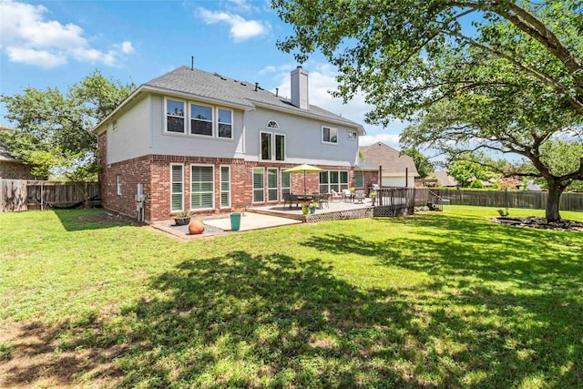 10601 Showboat Cv, Austin, TX 78730 - rear view of house with brick siding, a fenced backyard, a chimney, and a patio