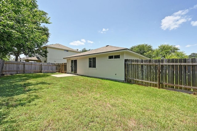 402 Colonial Park Blvd, Austin, TX 78745 - rear view of property with a fenced backyard