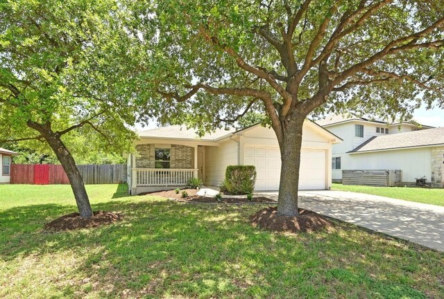 402 Colonial Park Blvd, Austin, TX 78745 - ranch-style home featuring a garage and concrete driveway