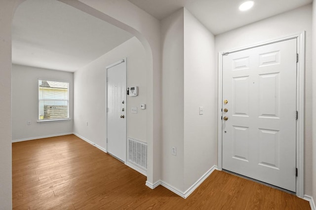402 Colonial Park Blvd, Austin, TX 78745 - entryway with wood finished floors, arched walkways, and recessed lighting