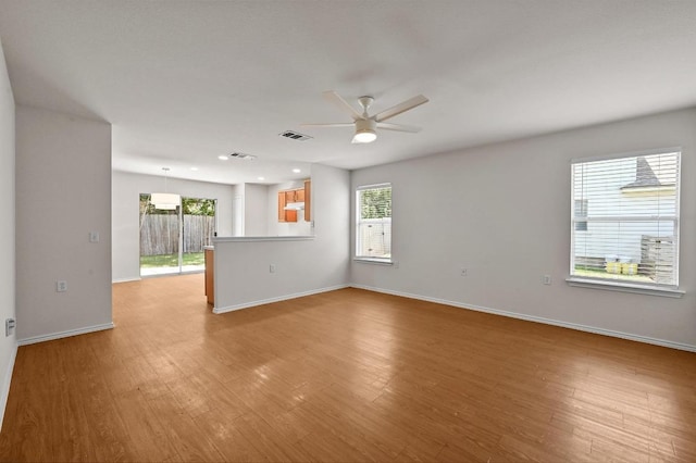 402 Colonial Park Blvd, Austin, TX 78745 - spare room with ceiling fan, plenty of natural light, and light wood-style floors