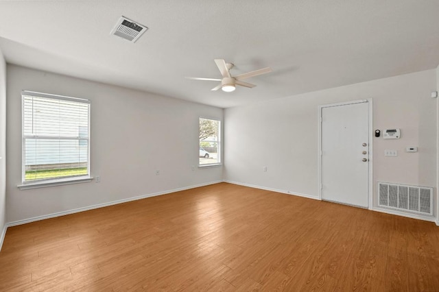 402 Colonial Park Blvd, Austin, TX 78745 - empty room featuring a ceiling fan and light wood finished floors