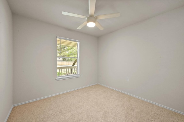 402 Colonial Park Blvd, Austin, TX 78745 - carpeted empty room with baseboards and a ceiling fan