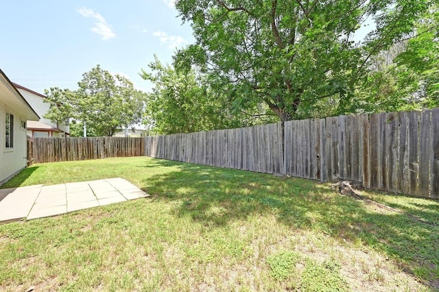 402 Colonial Park Blvd, Austin, TX 78745 - fenced backyard with a patio