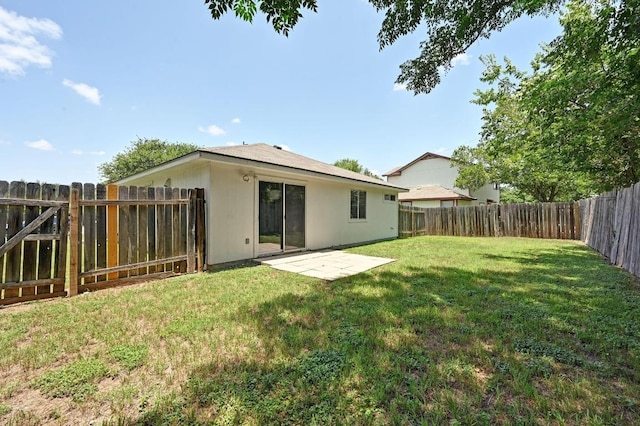 402 Colonial Park Blvd, Austin, TX 78745 - rear view of house with a fenced backyard and a patio area