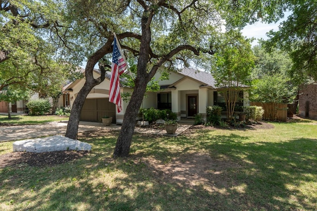 7625 Brecourt Manor Way, Austin, TX 78739 - view of front of home with stucco siding, a shingled roof, and driveway