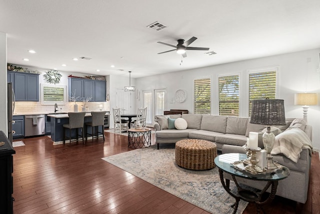 7625 Brecourt Manor Way, Austin, TX 78739 - living room with a ceiling fan, dark wood finished floors, and recessed lighting