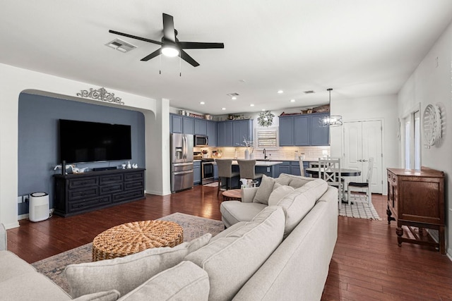 7625 Brecourt Manor Way, Austin, TX 78739 - living room with dark wood-style flooring, ceiling fan, and recessed lighting