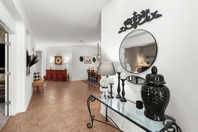 7625 Brecourt Manor Way, Austin, TX 78739 - corridor featuring arched walkways and baseboards