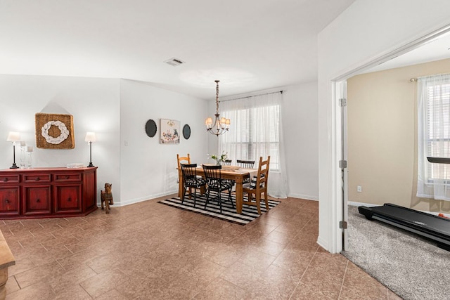 7625 Brecourt Manor Way, Austin, TX 78739 - dining room with a chandelier and baseboards
