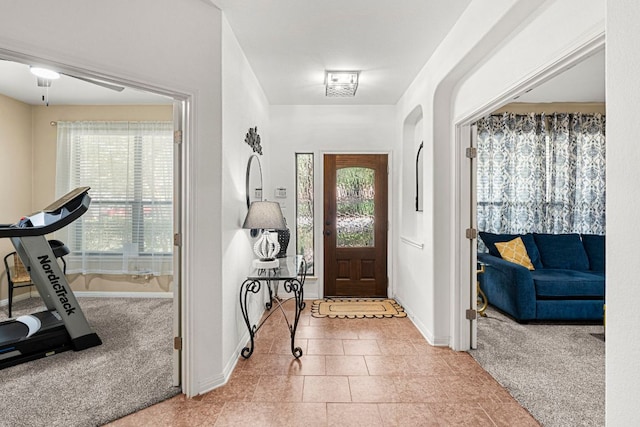 7625 Brecourt Manor Way, Austin, TX 78739 - entrance foyer with carpet flooring and ceiling fan
