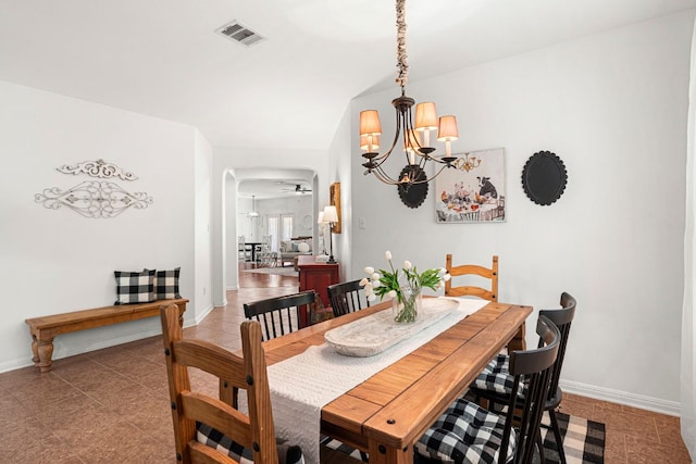 7625 Brecourt Manor Way, Austin, TX 78739 - tiled dining room with a chandelier, arched walkways, and ceiling fan