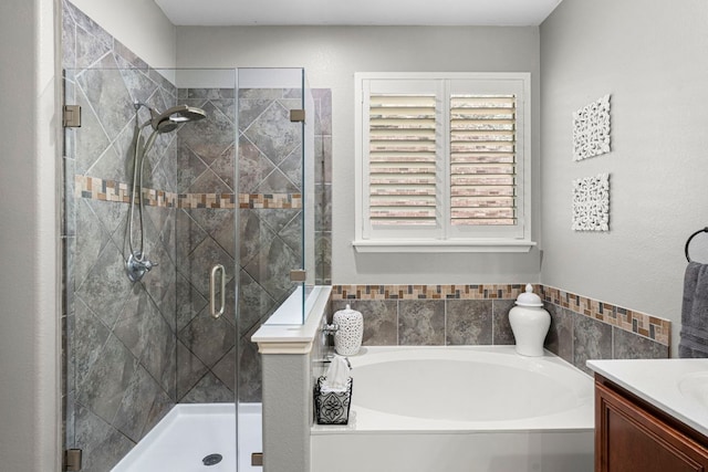7625 Brecourt Manor Way, Austin, TX 78739 - bathroom with a bath, vanity, and a shower stall
