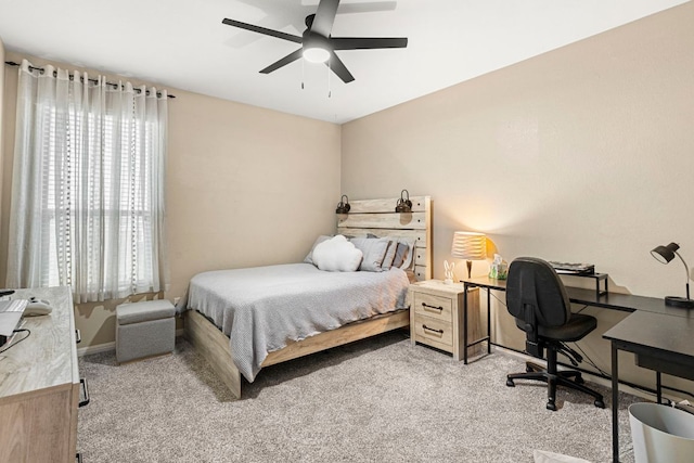 7625 Brecourt Manor Way, Austin, TX 78739 - bedroom with light colored carpet, multiple windows, an office area, and ceiling fan