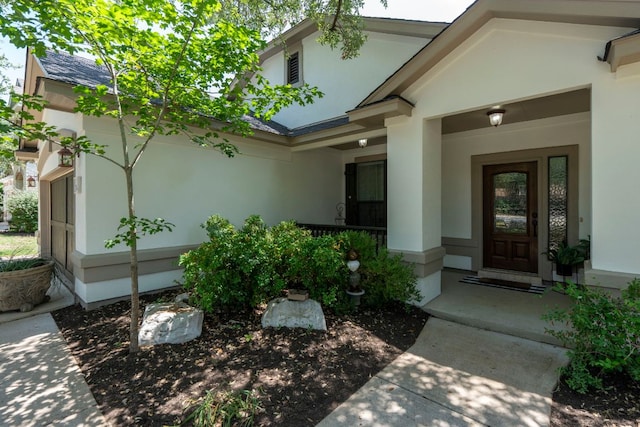 7625 Brecourt Manor Way, Austin, TX 78739 - property entrance featuring stucco siding and a porch