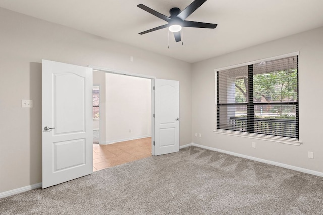 7625 Brecourt Manor Way, Austin, TX 78739 - unfurnished bedroom featuring carpet floors and a ceiling fan