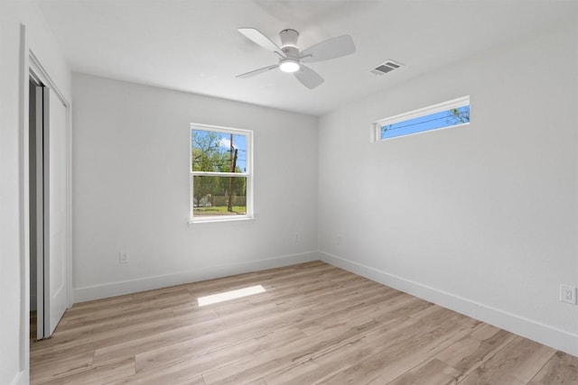 5604 Overbrook Dr, Austin, TX 78723 - unfurnished bedroom with light wood-style floors, a closet, and a ceiling fan