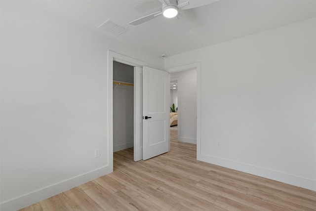 5604 Overbrook Dr, Austin, TX 78723 - unfurnished bedroom with light wood-style flooring, a closet, and a ceiling fan