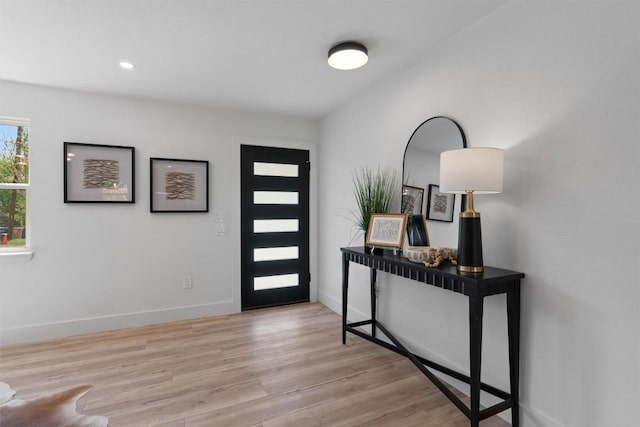 5604 Overbrook Dr, Austin, TX 78723 - foyer entrance featuring light wood-style floors and baseboards