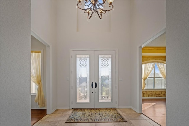 758 Mission Hts, New Braunfels, TX 78130 - foyer with french doors, a chandelier, and a high ceiling