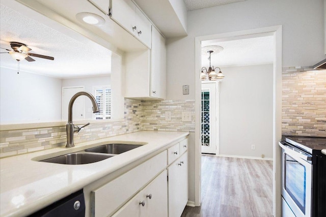 6718 Silvermine Dr Unit 201, Austin, TX 78736 - kitchen featuring electric stove, dishwasher, light countertops, tasteful backsplash, and white cabinetry