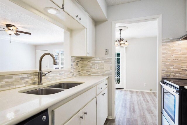 6718 Silvermine Dr Unit 201, Austin, TX 78736 - kitchen featuring stainless steel electric stove, dishwashing machine, light countertops, tasteful backsplash, and white cabinetry
