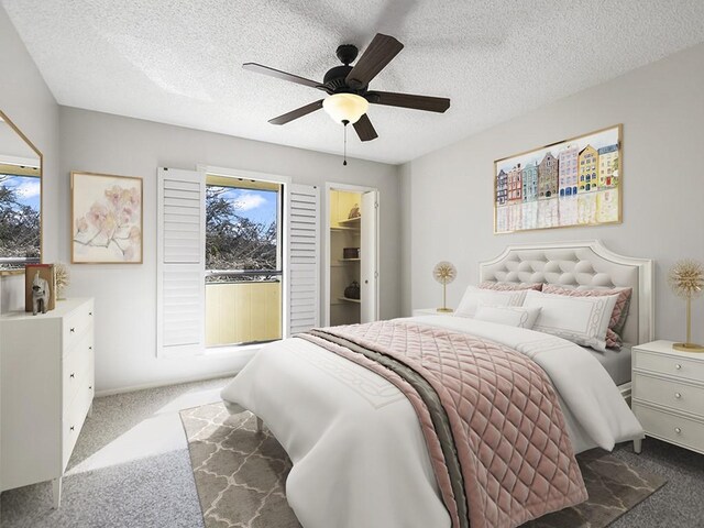 6718 Silvermine Dr Unit 201, Austin, TX 78736 - bedroom with dark carpet, ceiling fan, a walk in closet, and a textured ceiling