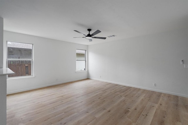 17129 Hamilton Point Cir, Manor, TX 78653 - unfurnished room with light wood-type flooring and ceiling fan