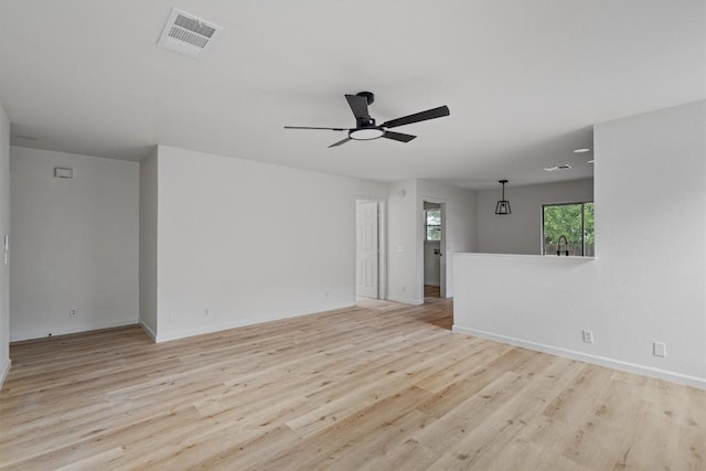 17129 Hamilton Point Cir, Manor, TX 78653 - spare room featuring ceiling fan and wood finished floors