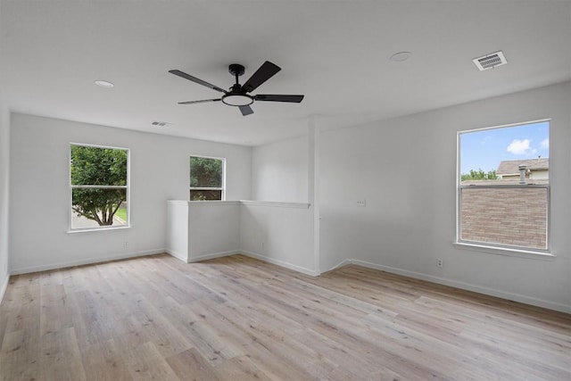 17129 Hamilton Point Cir, Manor, TX 78653 - unfurnished room with wood finished floors and ceiling fan