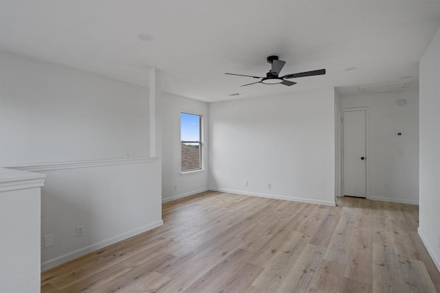 17129 Hamilton Point Cir, Manor, TX 78653 - empty room featuring light wood-style floors and a ceiling fan