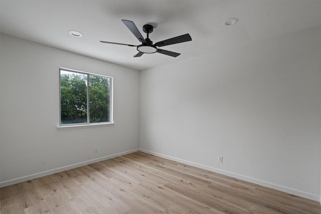 17129 Hamilton Point Cir, Manor, TX 78653 - unfurnished room with light wood-style floors, ceiling fan, and recessed lighting