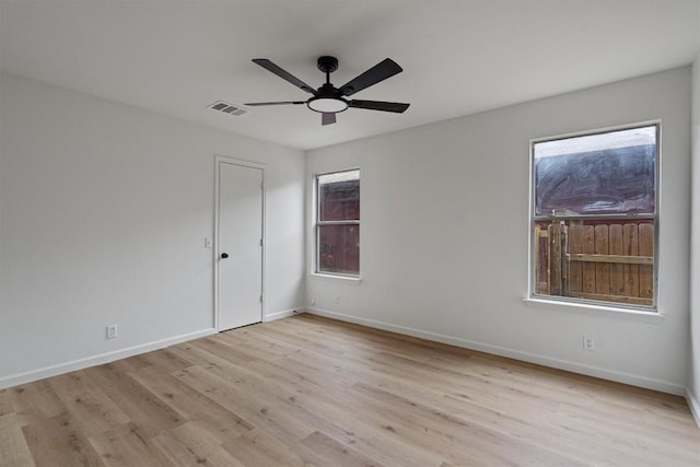 17129 Hamilton Point Cir, Manor, TX 78653 - unfurnished room featuring wood finished floors and a ceiling fan