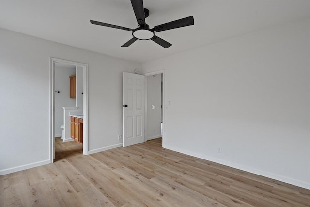 17129 Hamilton Point Cir, Manor, TX 78653 - unfurnished bedroom featuring light wood-style floors, ensuite bath, and ceiling fan