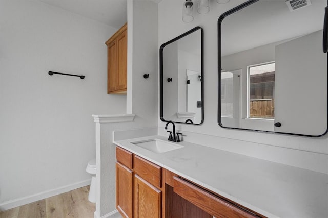 17129 Hamilton Point Cir, Manor, TX 78653 - full bathroom with wood finished floors and vanity