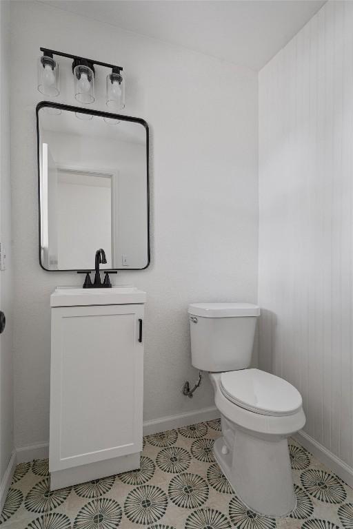 17129 Hamilton Point Cir, Manor, TX 78653 - half bathroom featuring vanity and tile patterned floors