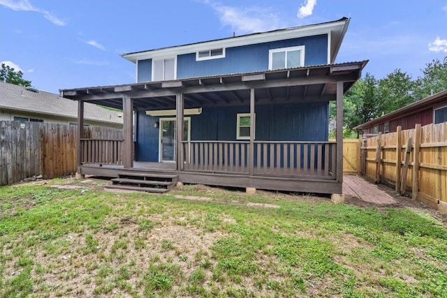 17129 Hamilton Point Cir, Manor, TX 78653 - rear view of house featuring a fenced backyard and a wooden deck