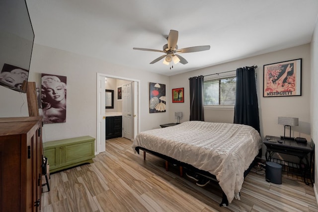 1300 Neans Dr, Austin, TX 78758 - bedroom with light wood-style flooring, a ceiling fan, and connected bathroom