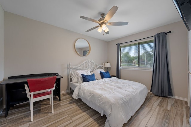 1300 Neans Dr, Austin, TX 78758 - bedroom featuring light wood-type flooring and a ceiling fan