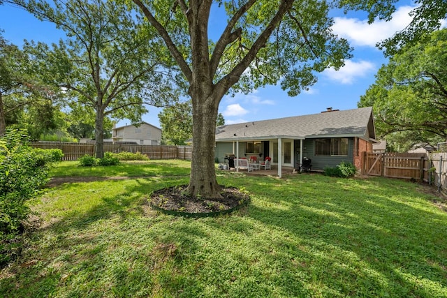 1300 Neans Dr, Austin, TX 78758 - fenced backyard with a patio area and a gate