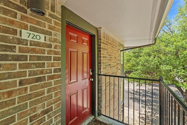 7685 Northcross Dr Unit 720, Austin, TX 78757 - property entrance featuring brick siding