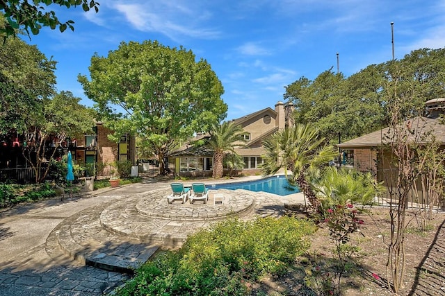 7685 Northcross Dr Unit 720, Austin, TX 78757 - outdoor pool featuring a patio