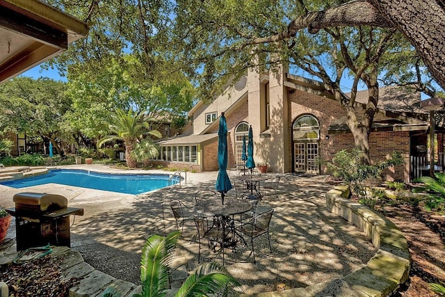 7685 Northcross Dr Unit 720, Austin, TX 78757 - swimming pool with a patio